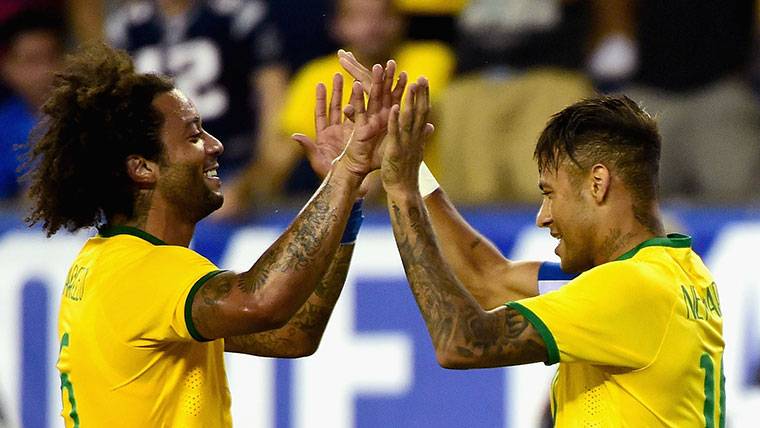 Marcelo and Neymar, celebrating a goal with Brazil