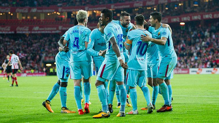 The players of the FC Barcelona celebrate a goal against the Athletic