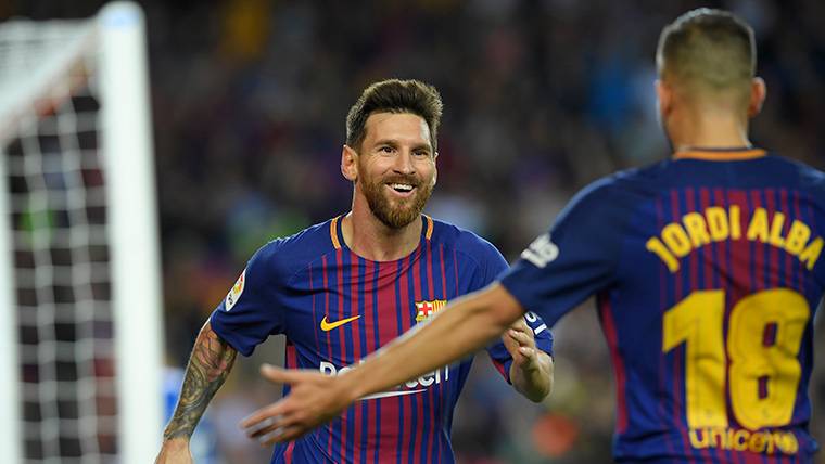 Jordi Alba, celebrating a goal with Leo Messi