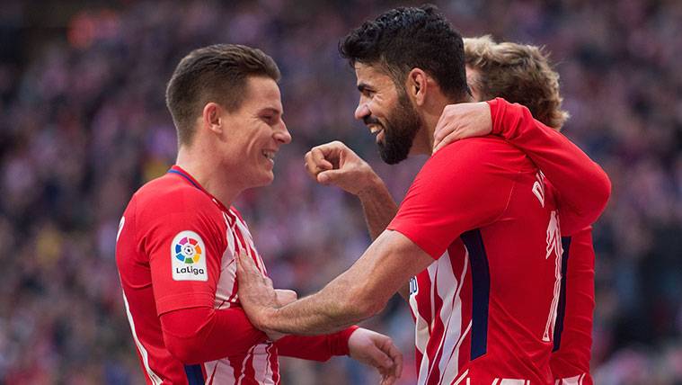 Kevin Gameiro, Diego Coast and Antoine Griezmann celebrate a goal of Athletic