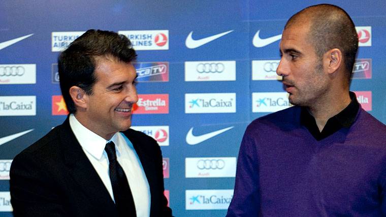 Joan Laporta, beside Pep Guardiola