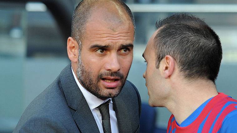 Andrés Iniesta and Pep Guardiola, in an image of archive