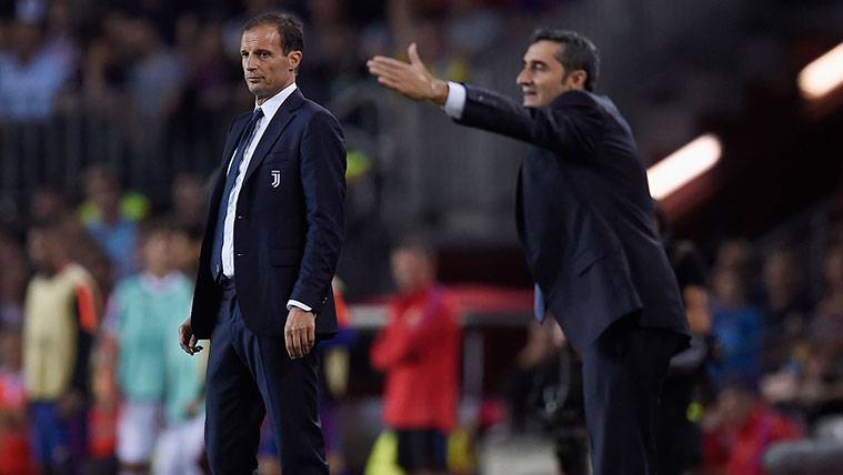 Massimiliano Allegri y Ernesto Valverde en un partido de Champions
