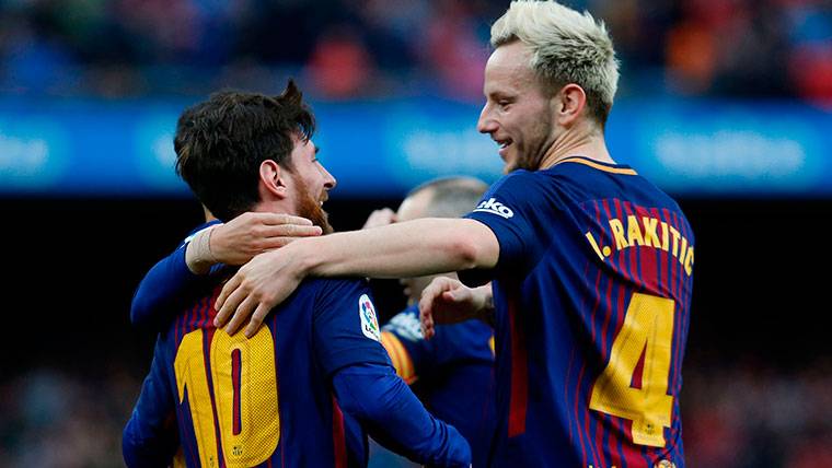 Ivan Rakitic, celebrating a goal with Leo Messi in the FC Barcelona