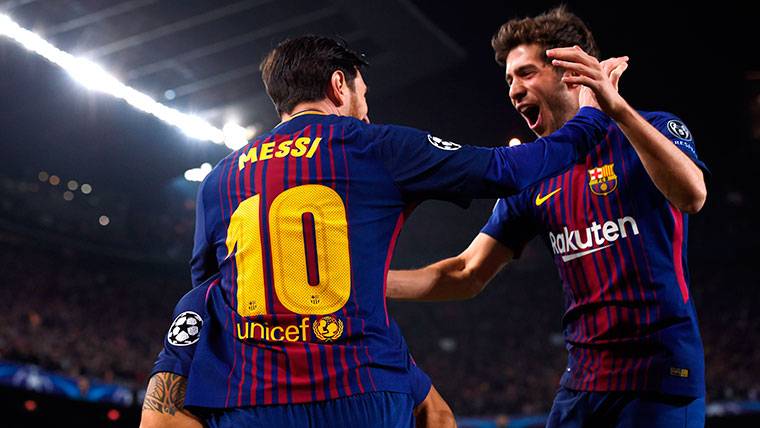 Leo Messi, celebrating a goal of the FC Barcelona with Sergi Roberto