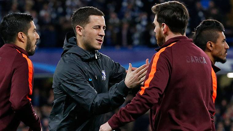 Eden Hazard and Leo Messi greet  before a party