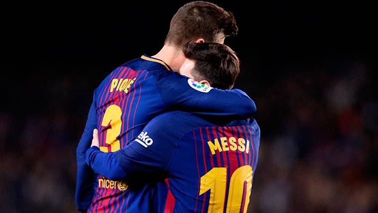 Gerard Hammered and Leo Messi celebrate a goal of the FC Barcelona
