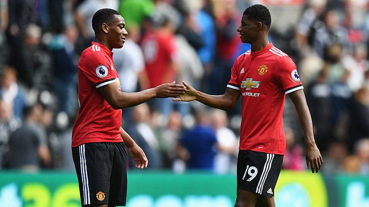 Anthony Martial and Marcus Rashford celebrate a triumph of the Manchester United