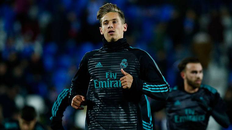 Marcos Llorente in a warming of the Real Madrid