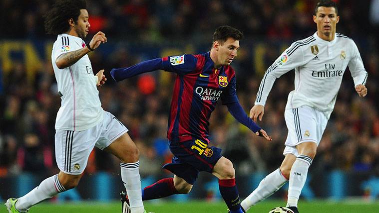 Marcelo, Leo Messi y Cristiano Ronaldo durante un Clásico