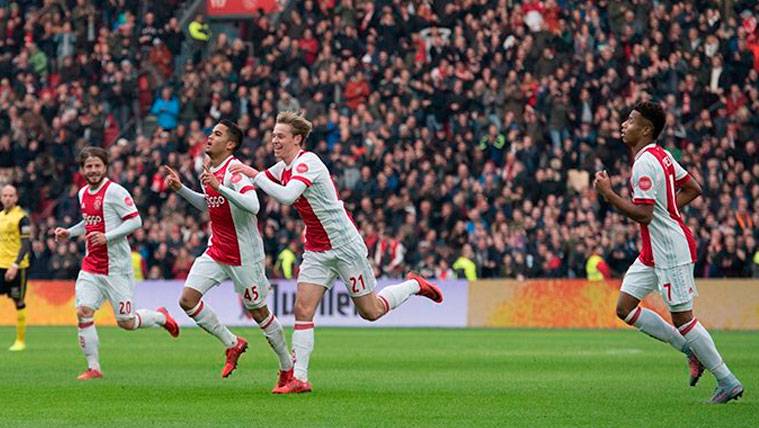 Justin Kluivert celebrates one of the goals of his first hat trick with the Ajax