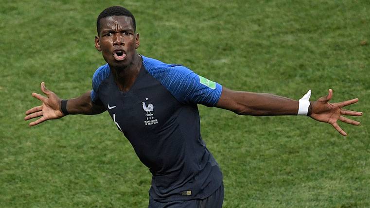 Paul Pogba celebrates a goal with the selection of France