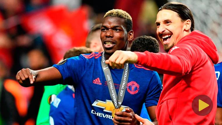 Paul Pogba and Zlatan Ibrahimovic celebrate a title with the Manchester United