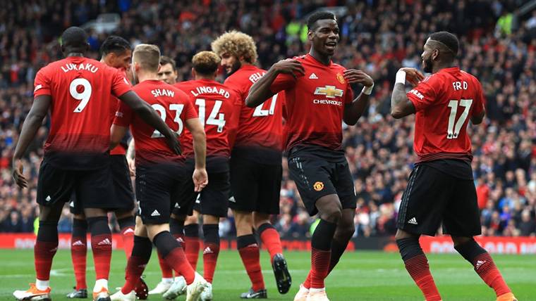 Paul Pogba, celebrating a goal of the Manchester United