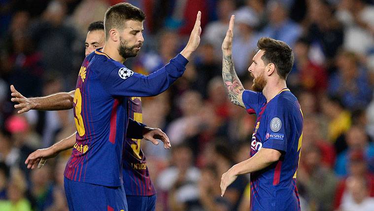Gerard Hammered and Leo Messi celebrate a goal of the FC Barcelona