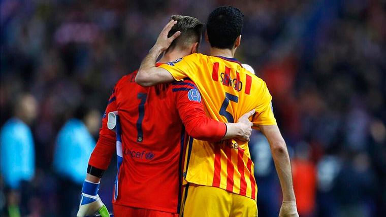 Ter Stegen And Sergio Busquets, embracing in an image of archive