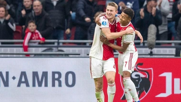 Matthijs Of Ligt and David Neres celebrate a goal of the Ajax