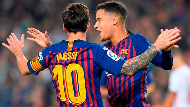 Messi and Coutinho celebrate a goal in the traced back copera in front of the Seville