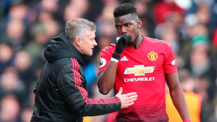 Ole Gunnar Solskjaer y Paul Pogba en un partido del Manchester United