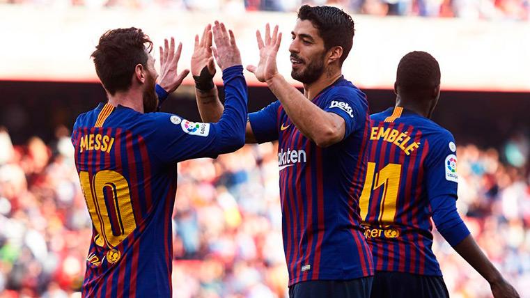 Messi and Luis Suárez celebrate a goal against the Seville