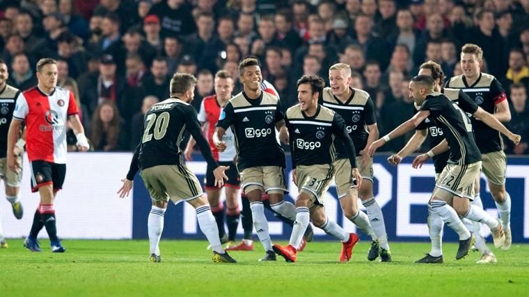 The players of the Ajax celebrate a goal in the Dutch Glass