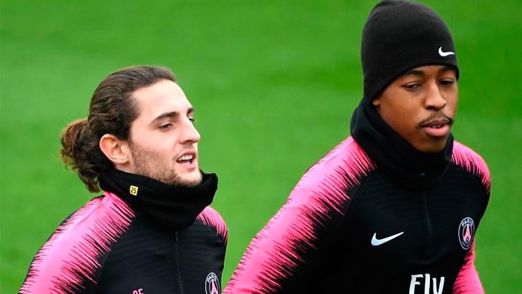 Adrien Rabiot and Presnel Kimpembe in a training of the PSG