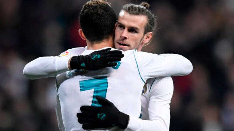 Gareth Bleat and Cristiano Ronaldo, embracing in an image of archive