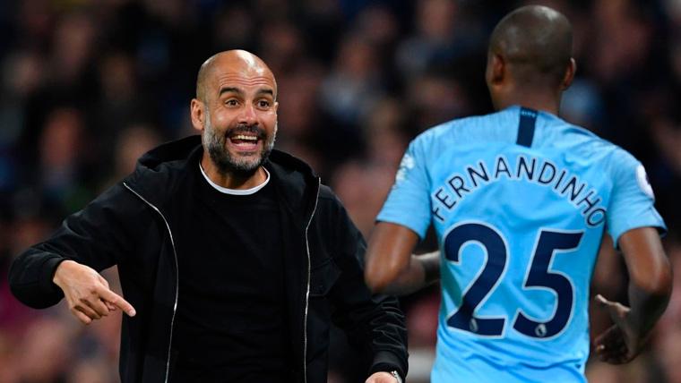 Pep Guardiola and Fernandinho in a party of the Manchester City
