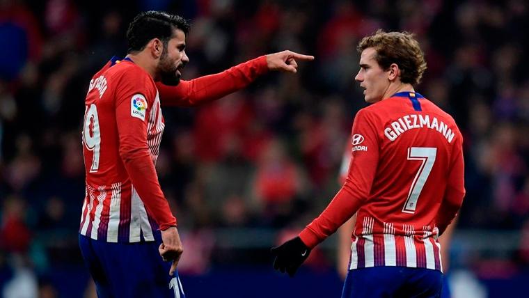 Diego Coast and Antoine Griezmann in a party of the Athletic of Madrid