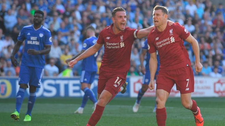 Jordan Henderson y James Milner celebran un gol del Liverpool