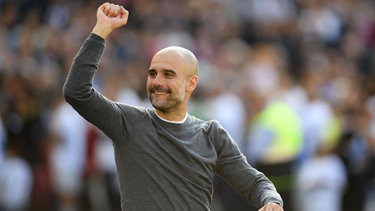 Pep Guardiola, celebrating the Premier League with the Manchester City