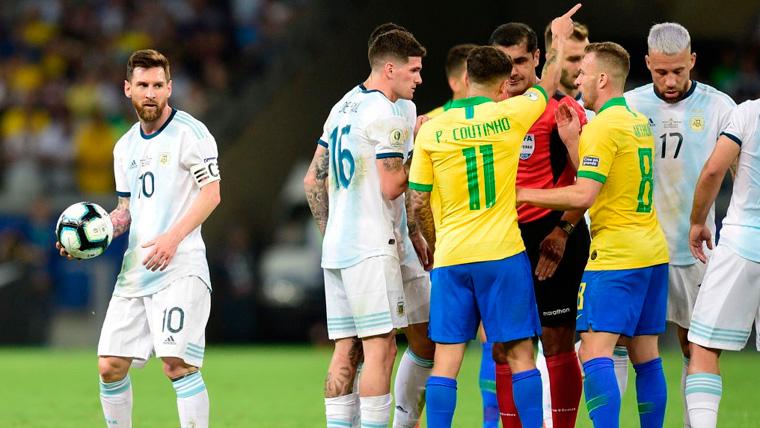 The players of Brazil and Argentina argue by a referee's decision