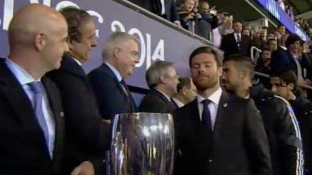Challenging look of xabi alonso to michel platini
