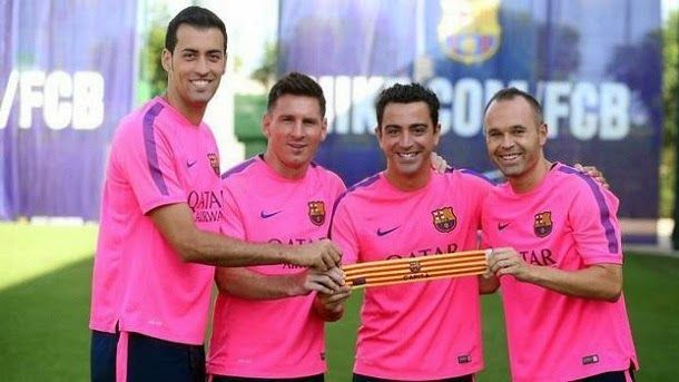 Xavi, iniesta, messi and busquets, captains of the barça 2014 2015