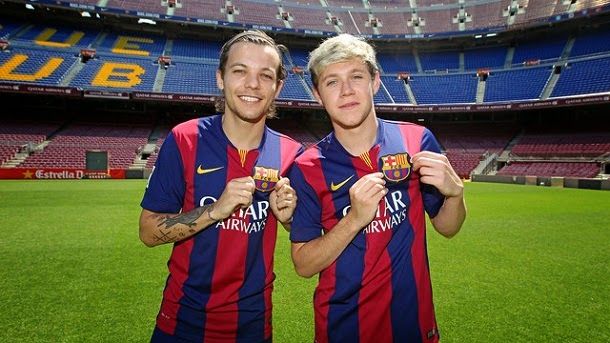 The group one direction visits the camp nou