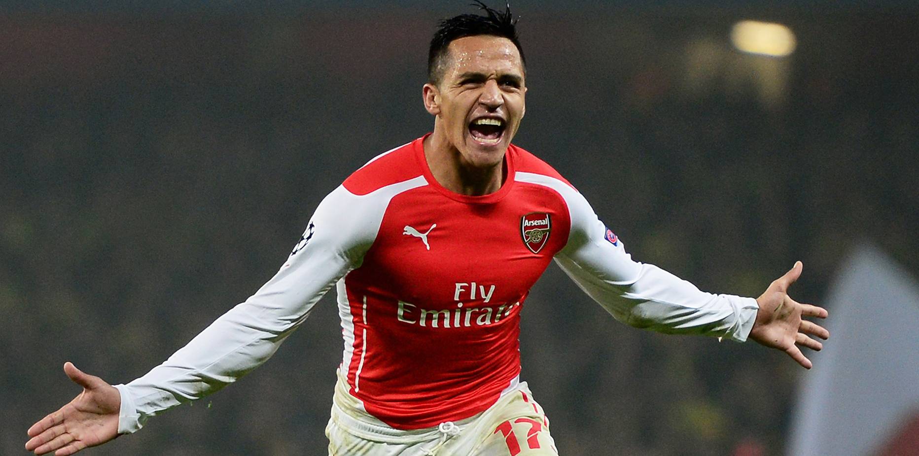 Alexis Sánchez, celebrating a goal with the Arsenal