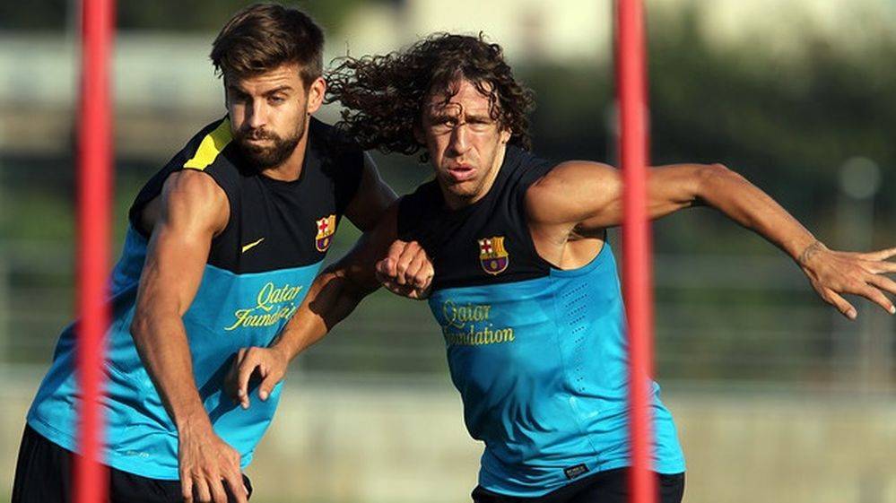 Gerard Hammered and Carles Puyol in a training with the FC Barcelona
