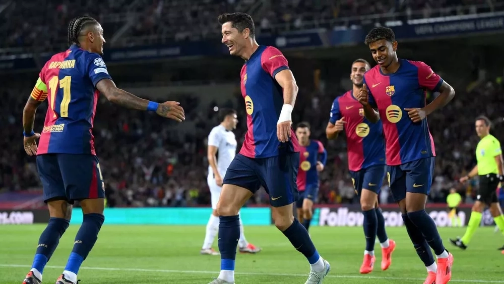 Raphinha, festejando un gol junto a Lewandowski y Lamine Raphinha, festejando un gol junto a Lewandowski y Lamine