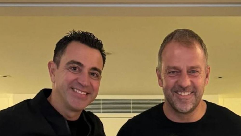 Xavi Hernández y Hansi Flick en un contacto en Barcelona