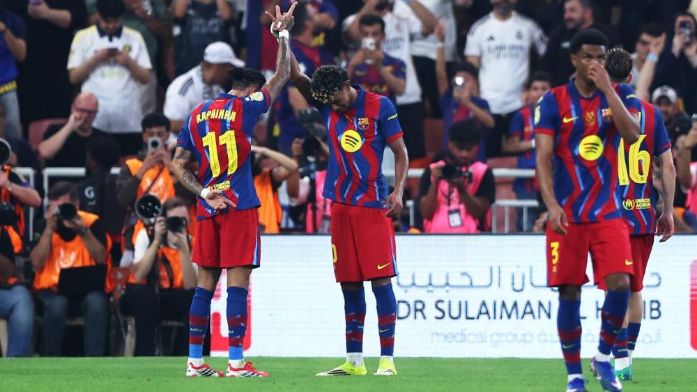 Raphinha, festejando junto a Lamine uno de sus goles en la final