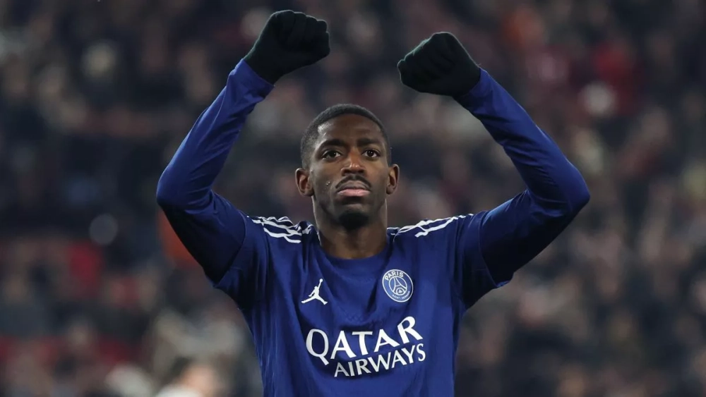 Ousmane Dembélé with his fists raised celebrating a goal with PSG