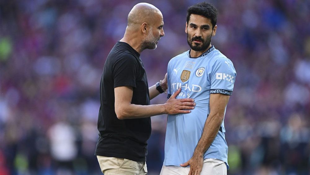 Pep Guardiola e Ílkay Gúndogan tras la final de la FA Cup 2025