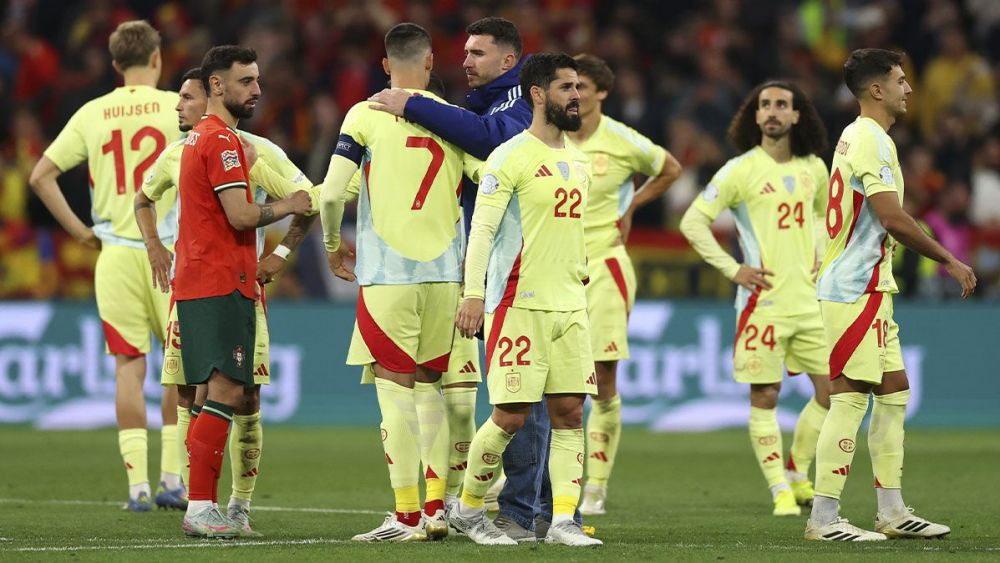 Bruno Fernandes greets the Spain players after the final