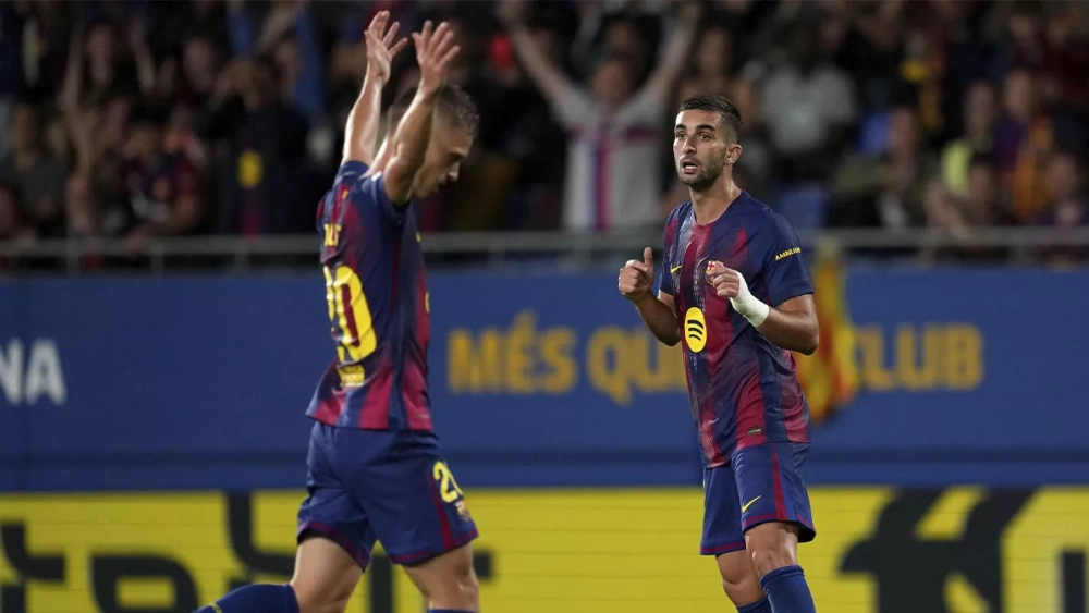 Dani Olmo and Ferran Torres, celebrating a goal against Getafe