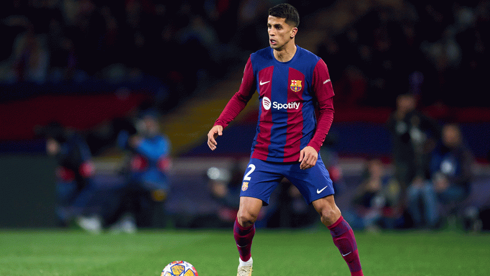 Joao Cancelo in a match wearing the FC Barcelona jersey